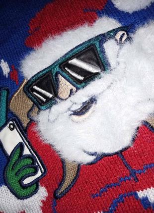 Синий рождественский свитер с сантой на сноуборде в очках9 фото