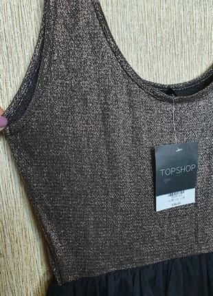 Повітряна, гарна сукня topshop
 розмір
 eur 38 us6 uk 10
 верх з люриксовою ниткою
 низ - спідниця олівець, а зверху шар фатину.
 нове4 фото