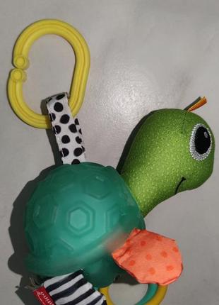 Підвісна іграшка на коляску infantino turtle черепашка 0+4 фото