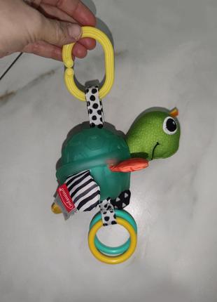 Підвісна іграшка на коляску infantino turtle черепашка 0+5 фото