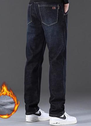 Зимові чоловічі джинси на флісі