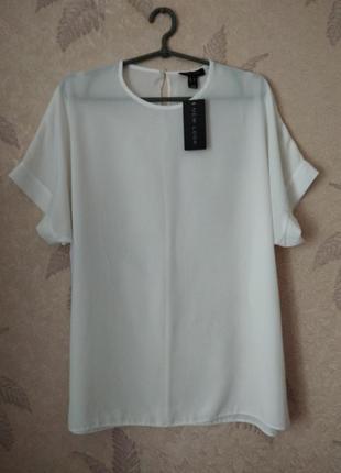 Симпатична базова біла блузка.2 фото