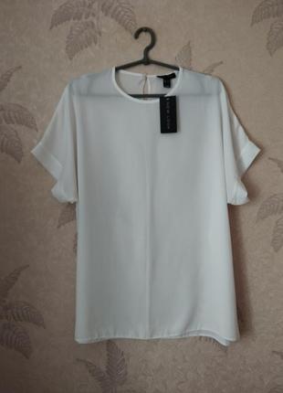 Симпатична базова біла блузка.8 фото
