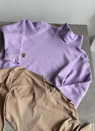 Сиреневый гольф из плотной ткани