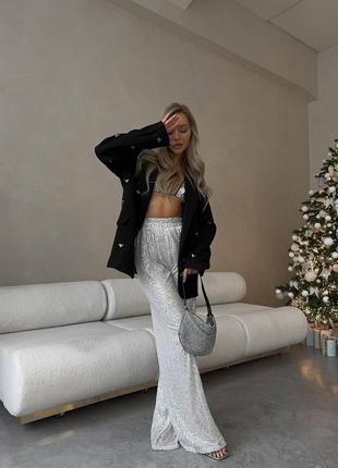 Штани з паєтки трикотажні вільні брюки палаццо кльош чорні сріблясті сірі новорічні святкові трендові стильні3 фото