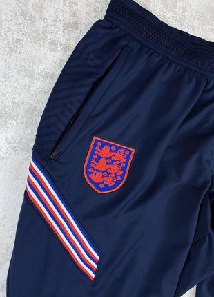 Nike england: элегантные темно-синие брюки для стильных приключений3 фото