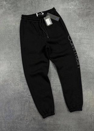 Чоловічі спортивні штани келвін кляйн чорні / теплі штани від calvin klein
