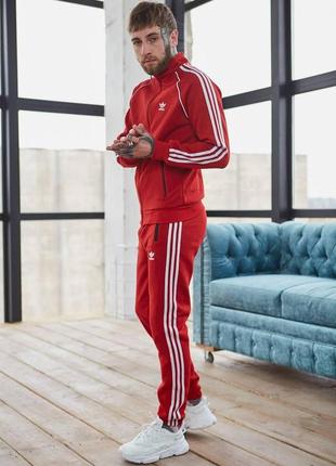 Спортивний костюм adidas червоний із лампасами зима l4 фото