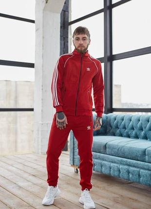 Спортивний костюм adidas червоний із лампасами зима l3 фото