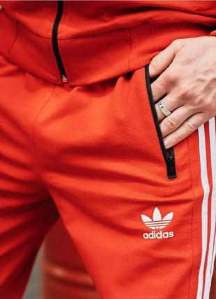 Спортивний костюм adidas червоний із лампасами зима l5 фото