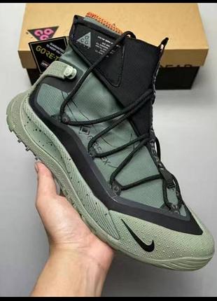 black and bronze nike shoe women sandals