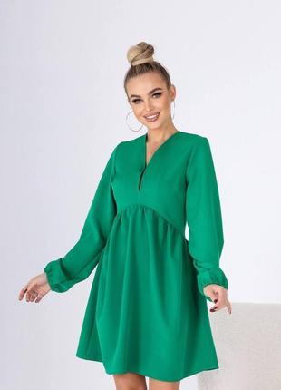 Яскрава святкова сукня зеленого кольору 42/441 фото