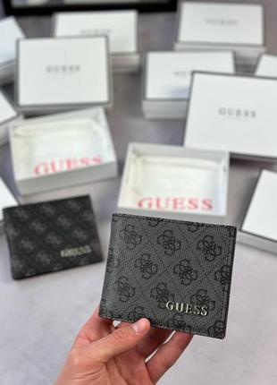 Гаманці guess2 фото