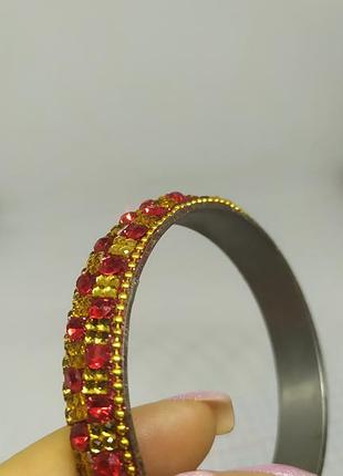 Браслет с красными и желтыми камнями