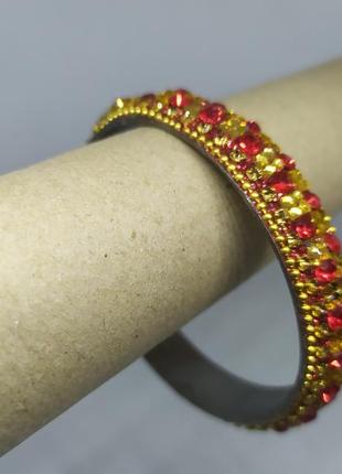 Браслет с красными и желтыми камнями