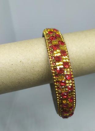 Браслет с красными и желтыми камнями