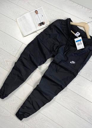 Штани nike sportswear pant cf woven core track1 фото