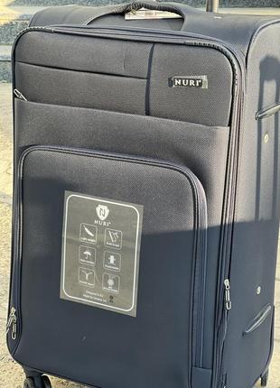 Якісна валіза з щільної тканини фірми nuri ,надійні колеса ,розширення ,чемодан ,кодовий замок,великий ,середній ,маленький,дорожня сумка7 фото