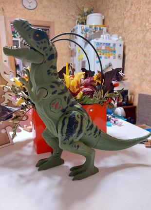 Іграшковий динозавр1 фото