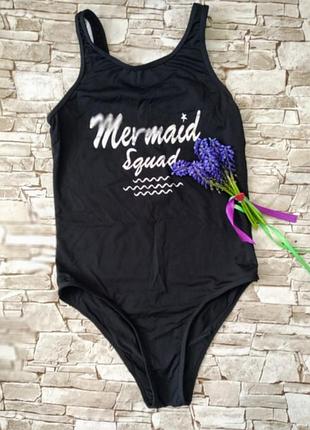 Купальник чорного кольору з надписьями.,yd