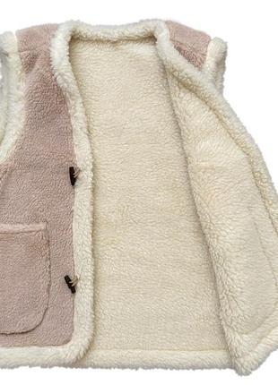 Тепла вовняна безрукавка з овчини (еко-шерсть) жіноча хутряна жилетка бежева 48-506 фото