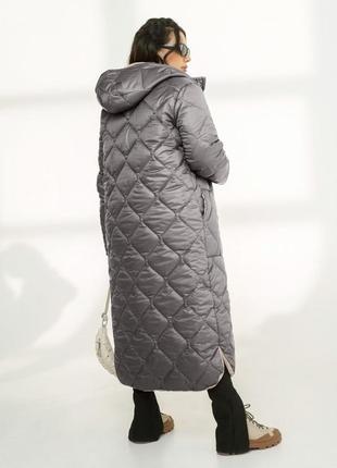 Куртка жіноча срібна / сіра довга стьобана з капюшоном2 фото