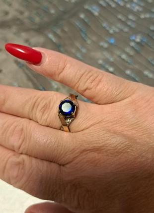 Перстень з синім каменем