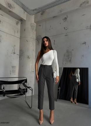 Элегантные классические брюки, пояс в комплекте.6 фото