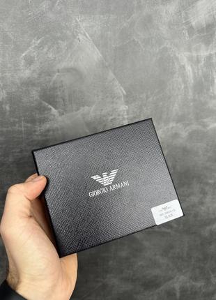 Чоловічий шкіряний гаманець на кнопці armani7 фото