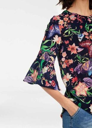 71.волновая блузка в яркий принт уникального американского бренда rick cardona.4 фото