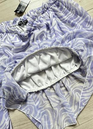 Сиреневая шифоновая блузка с открытыми плечами пышными рукавами и мраморным принтом select7 фото