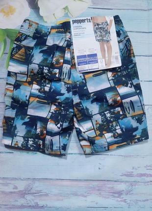 Пляжні шорти для хлопчика в яскравий принт на зав'язках4 фото