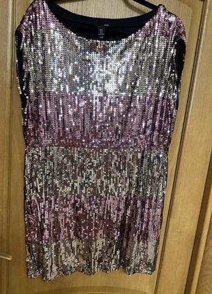 Коротенькі плаття в паєтки тягнеться 46-50 р