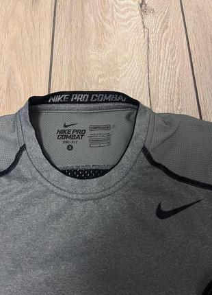 Чоловіча компресійна спортивна футболка nike pro combat8 фото