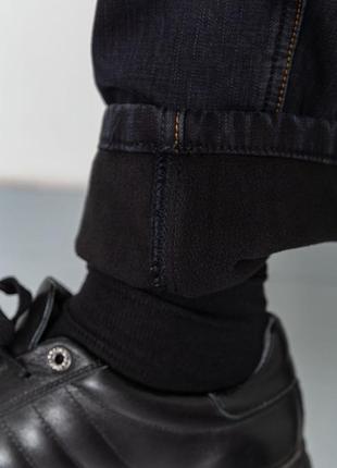 Утепленные джинсы на флисе с потертостями6 фото