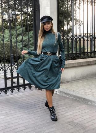 Теплу сукню з кишенями