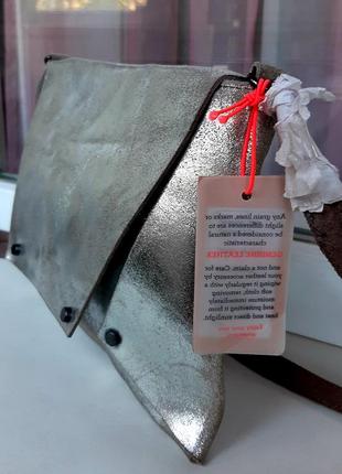 Стильная кожаная сумка-конверт в винтажном стиле beck sondergaard.3 фото