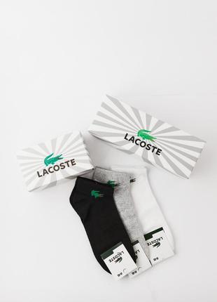 Подарунковий комплект чоловічих шкарпеток lacoste 9 пар 41-45 розмір с3088 шкарпетки  у коробці5 фото