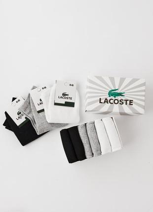 Подарунковий комплект чоловічих шкарпеток lacoste 9 пар 41-45 розмір с3088 шкарпетки  у коробці2 фото