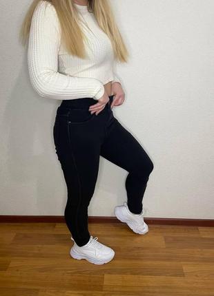 Женские теплые стрейчевые джинсы на флисе с карманами размеры 42-502 фото