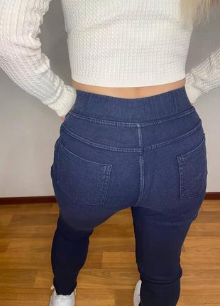 Женские теплые стрейчевые джинсы на флисе с карманами размеры 42-508 фото