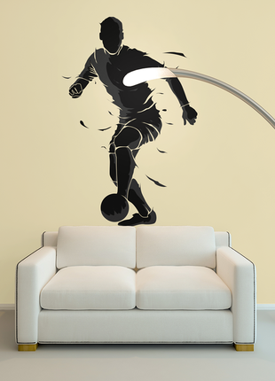 Вінілова інтер'єрна наклейка декор на стіну та шпалери для хлопчика "футбол. футболіст веде  м'яч.
