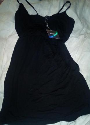 Маленькое черное платье на брителях на запах4 фото