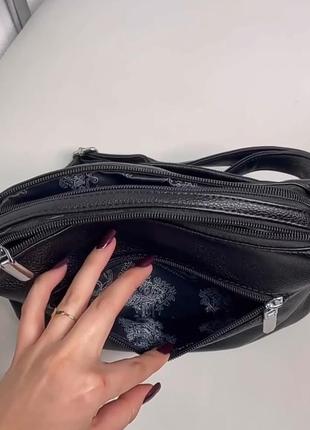 Удобная, вместительная черная сумочка+длинный регулируемый ремешок.7 фото