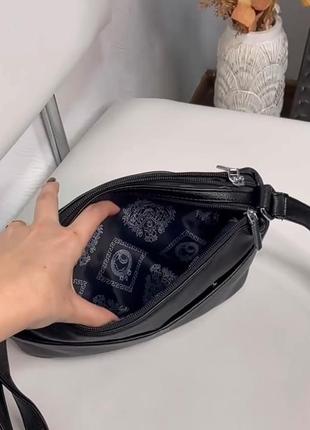 Удобная, вместительная черная сумочка+длинный регулируемый ремешок.5 фото