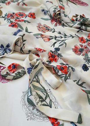 Ніжна молочна блуза у квіти з рюшами і зав'язками від roman3 фото