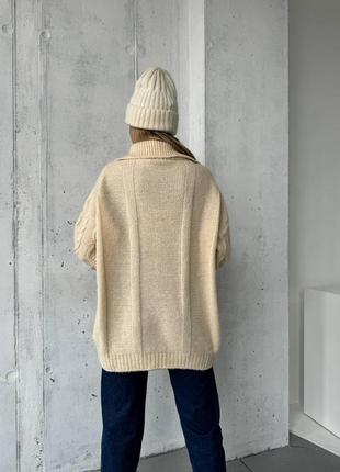 30% шерсть удлиненный свитер из плотного трикотажного полотна. модель свободного кроя с узором косы горловина на молнии6 фото