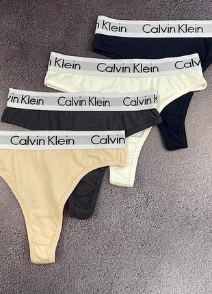 Подарочный набор женские стринги из 4 шт. calvin klein с3111 разные цвета хлопок трусики в коробке3 фото