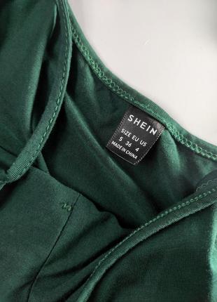Комбінезон брючний жіночий зеленого кольору клешь на бретелях від бренду shein xs s5 фото