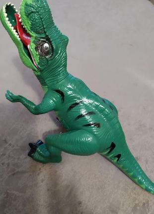 Іграшка музична динозавр4 фото
